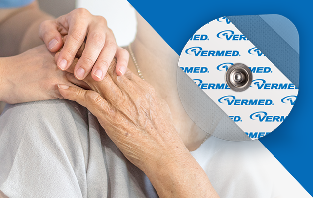 lose-up of a caregiver holding an older adult’s hand; gentle ECG electrode materials shown in inset.