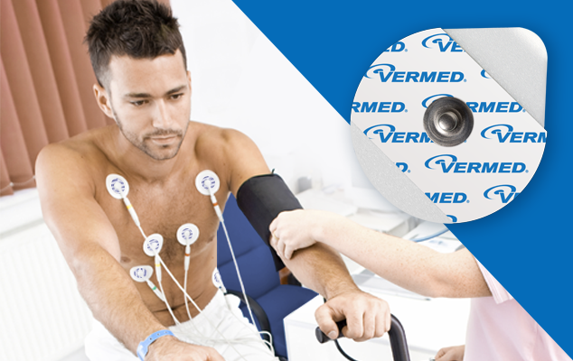 atient on an exercise stress test wearing multiple ECG electrodes while a clinician checks blood pressure; Vermed electrode close-up.